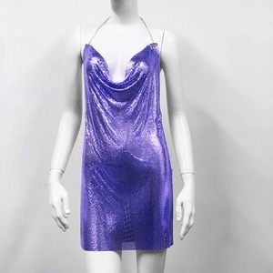 Detailed view of the purple metallic sequin mesh fabric on a sexy halter party dress