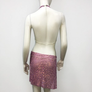 Back view of pink rhinestone mesh two-piece set with halter top and mini skirt on a mannequin
