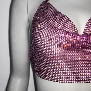 Close-up of purple rhinestone mesh top with metallic chain links for party wear