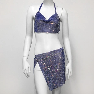 Detailed view of sexy blue sequin two-piece set with halter top and slit skirt