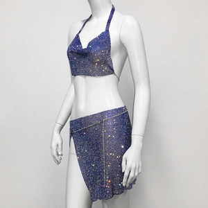 Detail of dark blue rhinestone two-piece set with halter top and mini wrap skirt