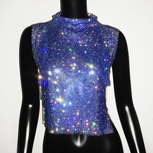 Detailed close-up of sparkling royal blue rhinestone sleeveless crop top on a mannequin