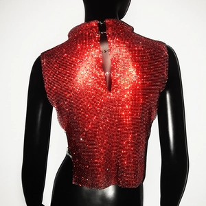 Detail of red rhinestone halter top featuring open back and silver lobster clasps