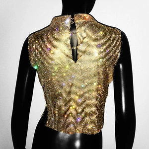 Detail view of the gold rhinestone mesh halter top featuring back lobster clasp closures