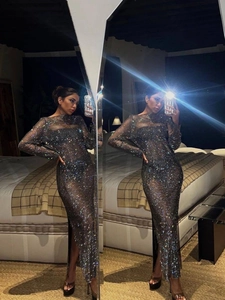 Sparkling rhinestone mesh dress with sheer fishnet fabric and long sleeves for party