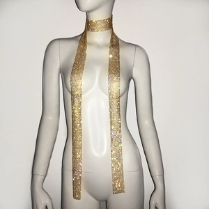Detailed view of luxury gold sequin scarf with sparkling rhinestone mesh for party wear