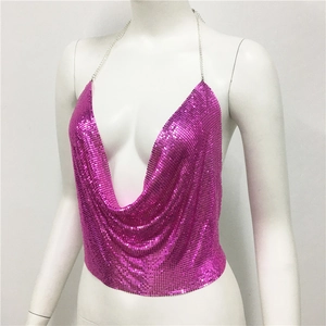 Detail of fuchsia metallic sequin halter top featuring a deep V-neck and mesh chain design