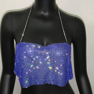Close-up of sparkling blue rhinestone halter top with reflective metallic sequins