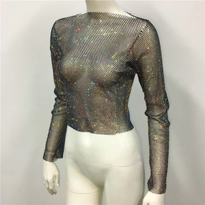 Macro view of long sleeve mesh top featuring sparkling multi-color rhinestones