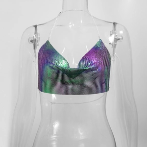 Macro detail of metallic mesh sequins with purple and green gradient effect for festivals