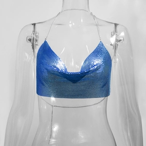 Detail of the royal blue sequin metal mesh halter top featuring shiny metallic chain links