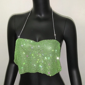 Detail of neon green metallic mesh crop top with rhinestones and chain strap