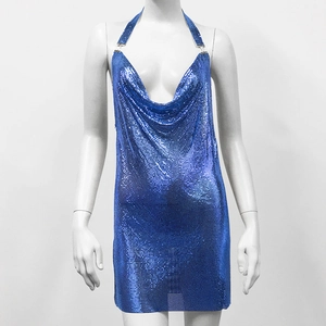 Close-up of blue metallic sequin mesh fabric on a halter mini party dress