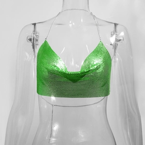 Detail view of the shiny green sequin halter top with delicate silver metal chains