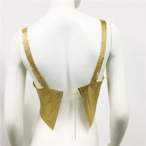 Close-up of gold sequin metal crop top showing the adjustable back chain detail