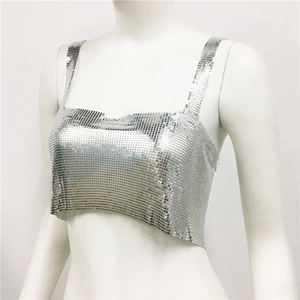 Detailed view of silver metal sequins with square links on a crop top camisole