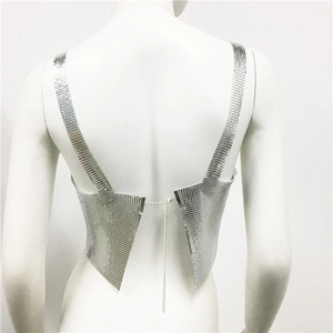 Detail of silver sequin metal mesh top showing the back chain closure on a mannequin