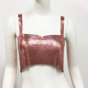Close-up of rose gold sequin crop top with metallic mesh texture for party wear