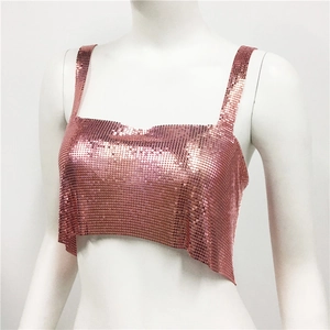 Detail of rose gold metallic mesh crop top with shimmering sequins and thin straps
