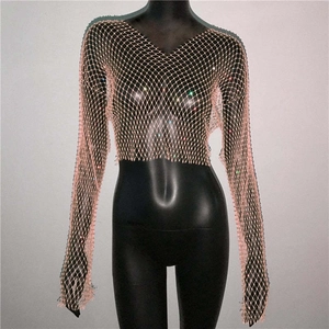 Close-up of sparkling rose gold rhinestone fishnet crop top with deep V-neck