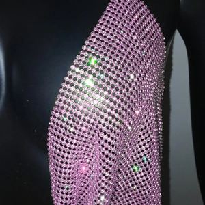 Macro detail of lavender rhinestone mesh halter top showing shimmering crystal grid texture