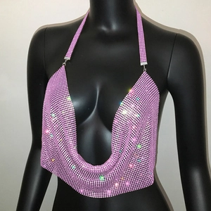 Detailed close-up of pink rhinestone mesh halter top with cowl neck for party wear