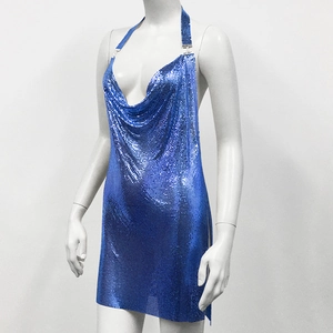 Close-up of royal blue metal sequins and draped deep V-neck on backless mini dress