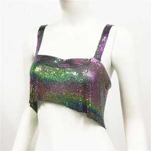 Detail of colorful metallic sequin crop top with shimmering holographic scale texture