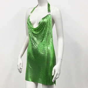 Detail shot of bright green metallic mesh dress with a draped cowl neck and halter style
