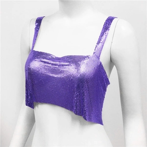 Close-up of purple metallic sequin mesh fabric on a sexy party crop camisole