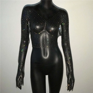 Detailed close-up of mesh top featuring vibrant colorful rhinestones on black fabric