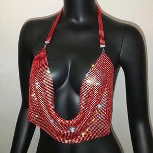 Close-up of red rhinestone halter neck crop top with sparkling diamond details