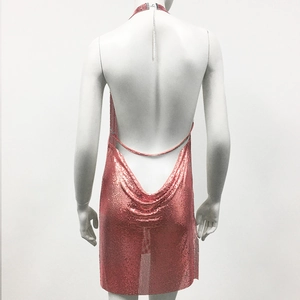 Detail of rose gold sequin mesh halter dress with an open back on a white mannequin