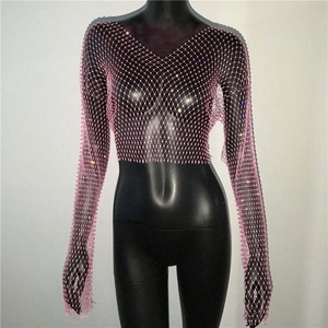 Detail of pink fishnet crop top with colorful rhinestones on a mannequin