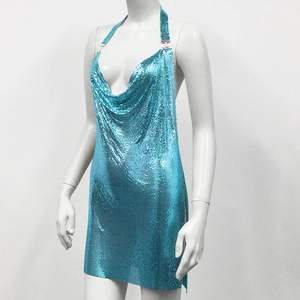 Detail of lake blue chainmail halter dress with metallic sheen and deep V-neck style