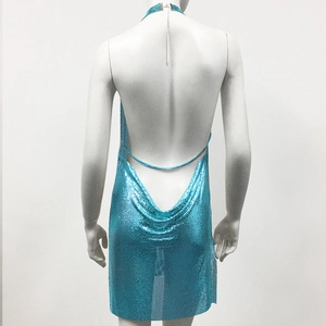 Macro detail of the blue metallic sequin halter dress showing the sexy backless cowl design