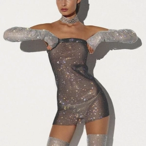 Detailed view of silver rhinestone mesh mini dress set with arm sleeves and stockings