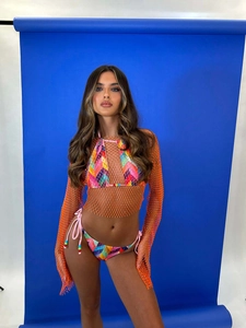 Detailed view of neon orange fishnet mesh cover-up with vibrant geometric bikini set