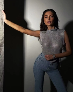 Detailed texture of sparkling silver metallic mesh high neck sleeveless party top