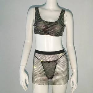Close-up of black mesh bikini set with sparkling rhinestones and sheer fishnet texture
