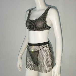 Close-up of black mesh two-piece set featuring sparkling rhinestones on mannequin