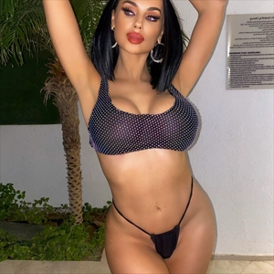Sexy black three-piece bikini set with sparkling rhinestones and matching mesh skirt