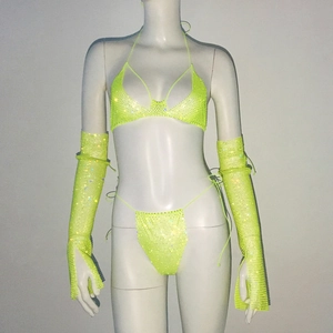 Detail of neon green rhinestone bikini set with matching long mesh fingerless gloves