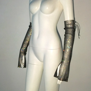 Close-up of sparkling rhinestone mesh arm sleeves with adjustable drawstring and fingerless design