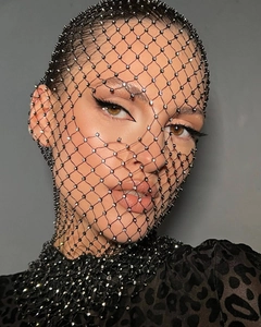 Detail shot of sparkling rhinestone mesh headpiece for fashion styling and performances