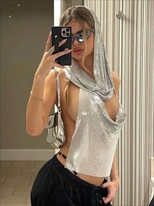 Detailed view of sexy silver metallic sequin hooded halter top with chainmail texture