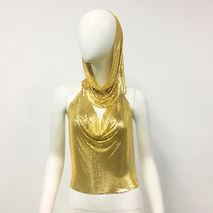 Detail of gold metal mesh sequins on a hooded halter top with high metallic shine
