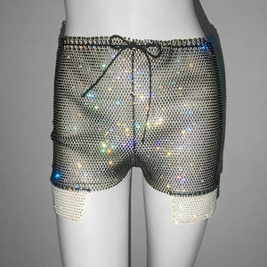 Detail of drawstring waist and shimmering rhinestones on black mesh party shorts