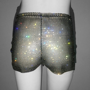 Detailed back view of black high waist rhinestone mesh shorts on a mannequin