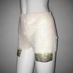 Detailed view of luxury rhinestone mini skirt with drawstring side and glitter crystal mesh